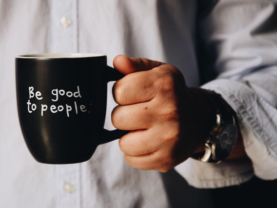 Coffee mug with the words "Be Good to People" - Employee advising