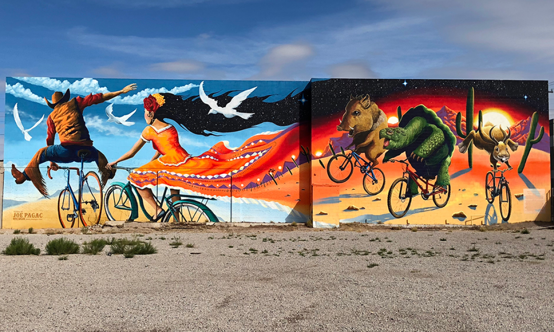 Large mural by Joe Pagac - people and animals riding bicycles